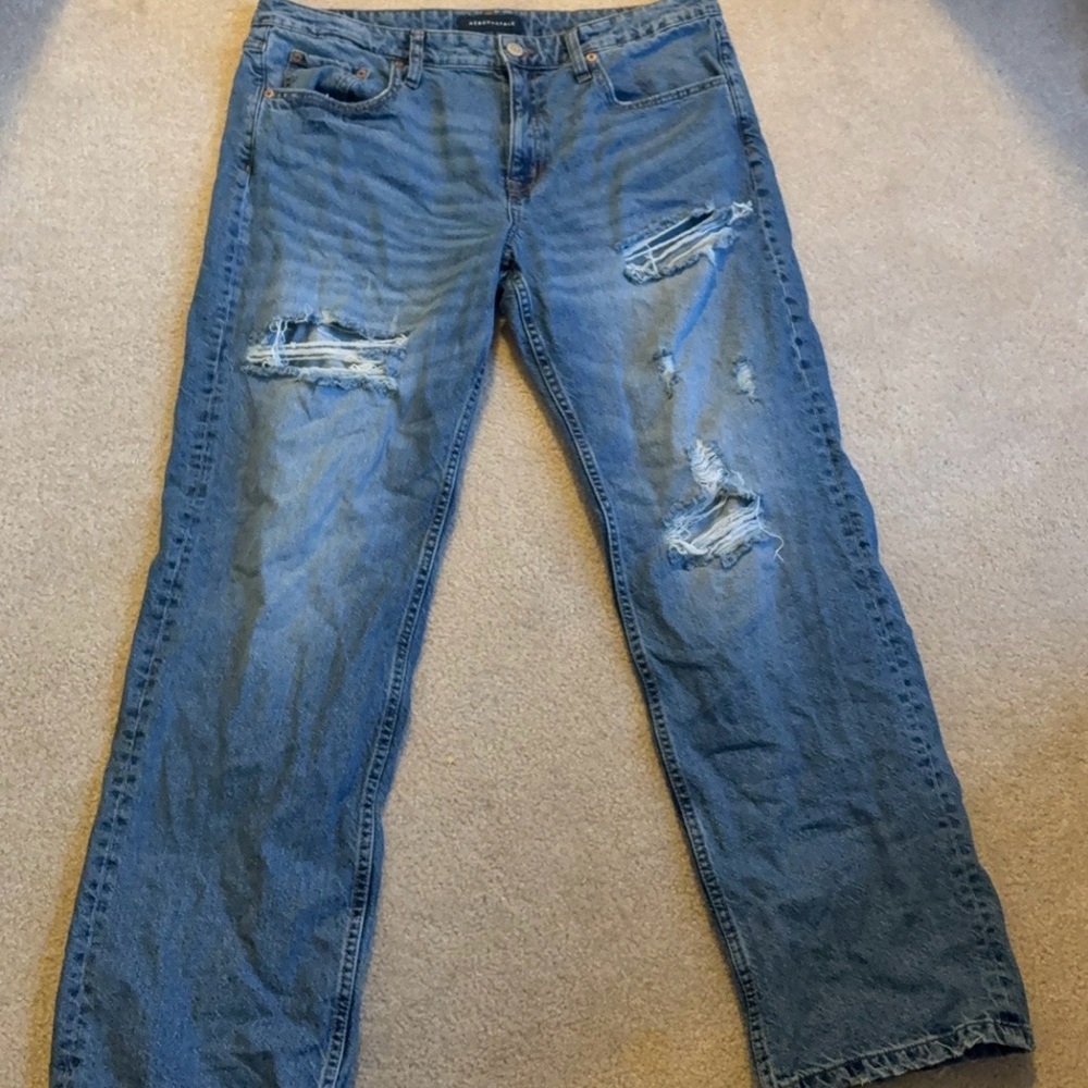 Distressed Blue Denim Jeans